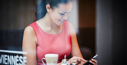 woman-in-cafe-on-phone