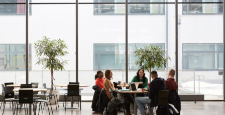 people at table in discussion