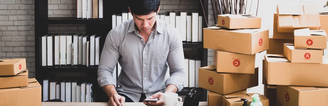 Man using a calculator