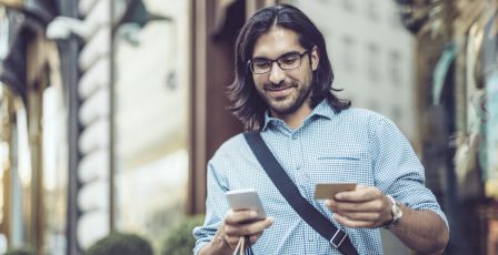 Young businessman shopping in the city