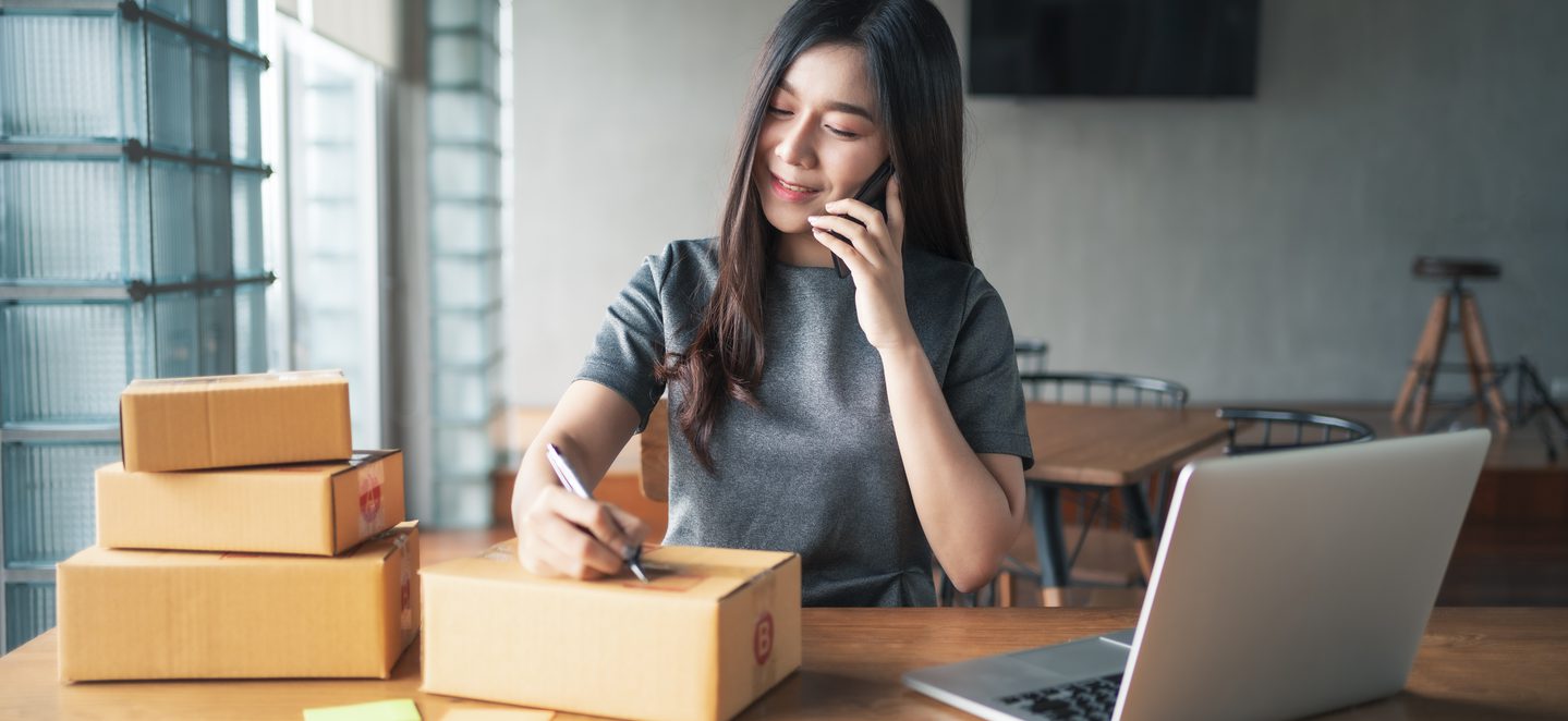 Young business woman working selling online