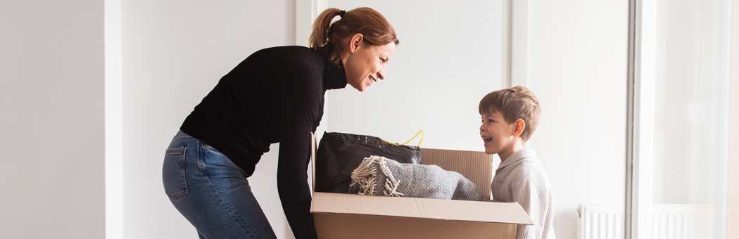 Woman and child moving house