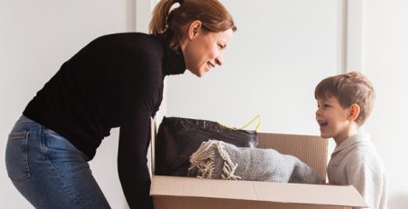 Woman and child moving house