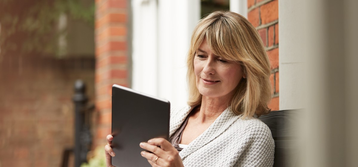 Woman browsing on tablet