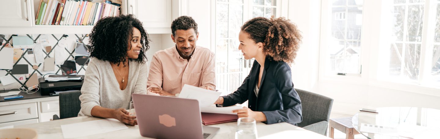 Couple speaking to their accountant