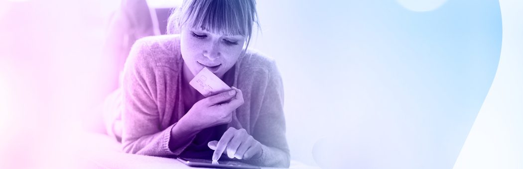 Woman paying on phone