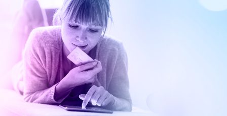 Woman paying on phone