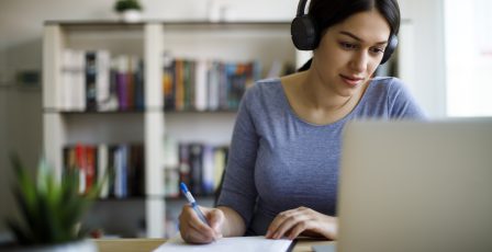 Woman at home on computer