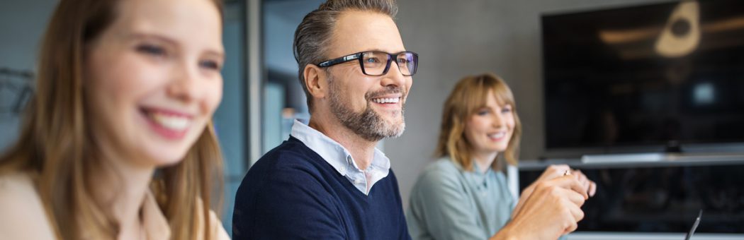 Group of professionals working together in office