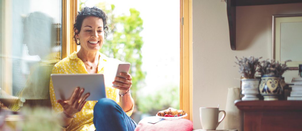 Woman is purchasing online at home