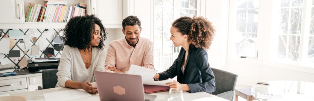 Couple speaking to a mortgage broker