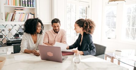 Couple speaking to a mortgage broker