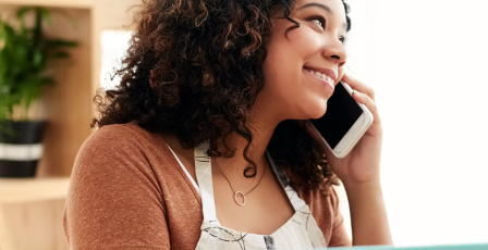 Business owner using telephone