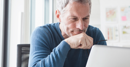 Mature man using a laptop