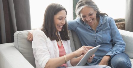 Women reading digital tablet