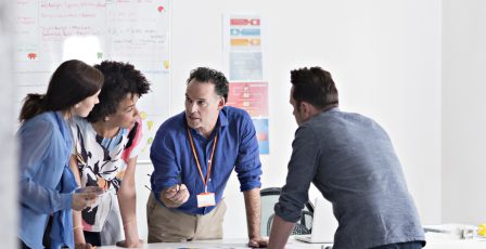 Colleagues in a team meeting talking strategy