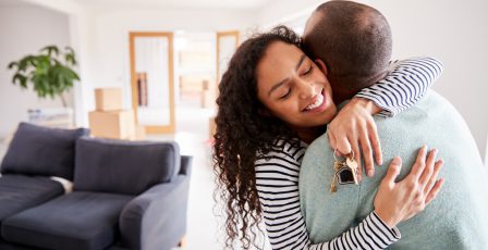 Woman getting keys to house