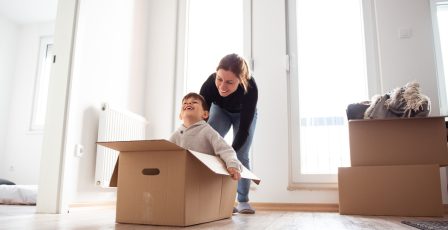 Mother and son moving in new apartment