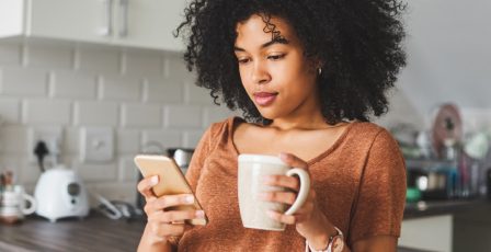 Woman reading on her phone