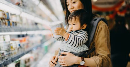 Woman and her child shopping in a supermarket