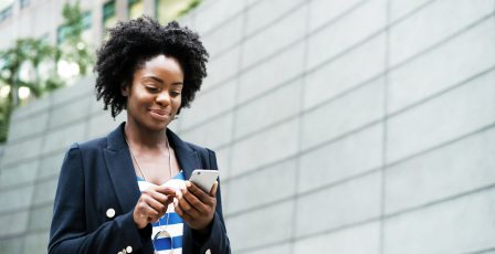 Woman outside using her mobile phone