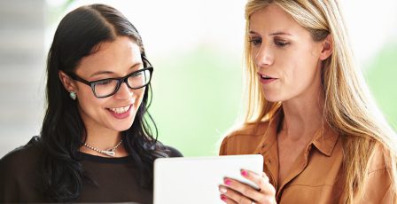 Two colleagues screening prospective employees