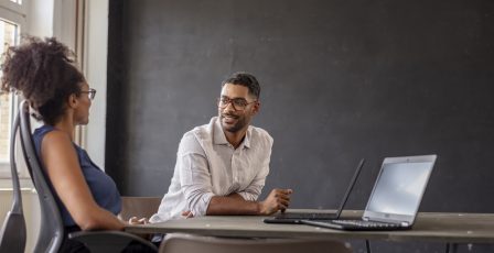 Two colleagues talking in the office