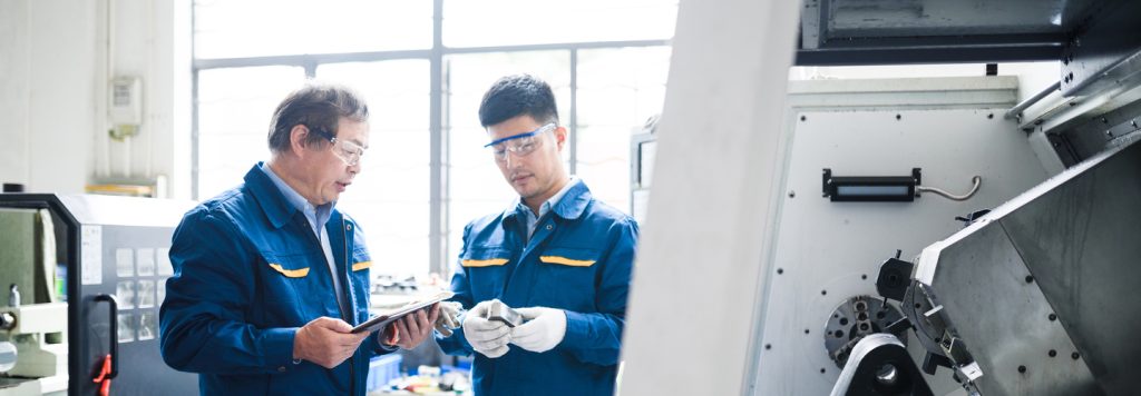 Engineers working in a factory