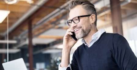 Man talking on the phone in an office