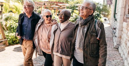 Active seniors walking in the city