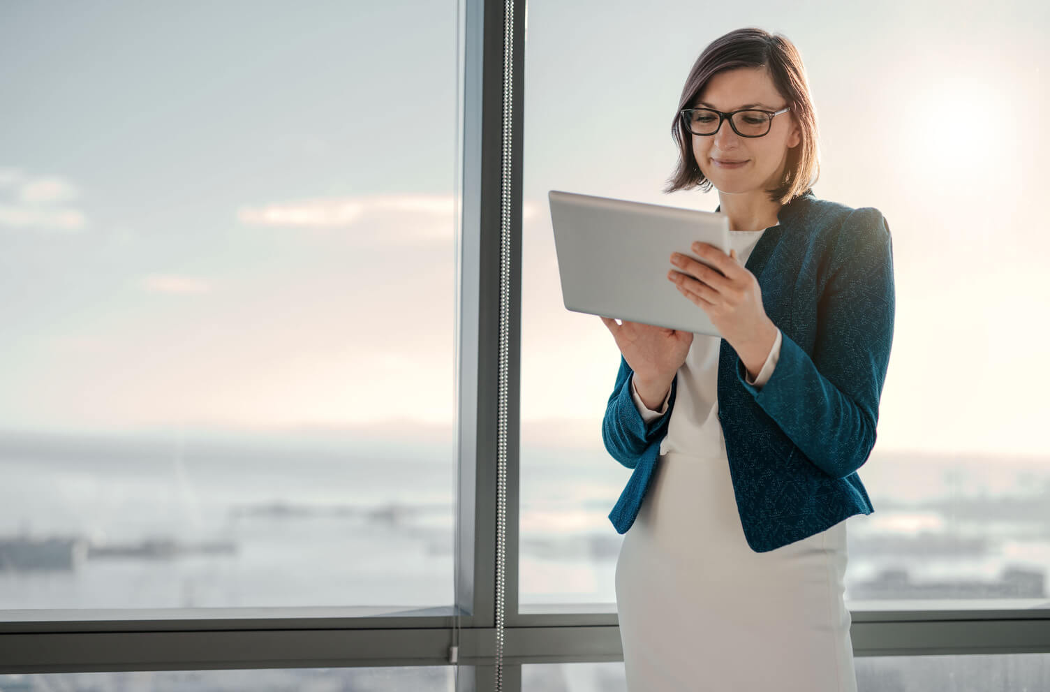 Young business owner looking at her business customer records