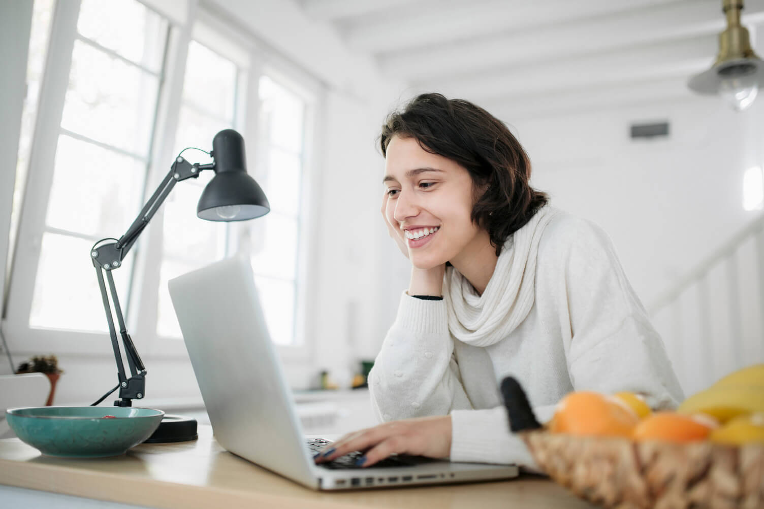 Woman watching a marketing webinar