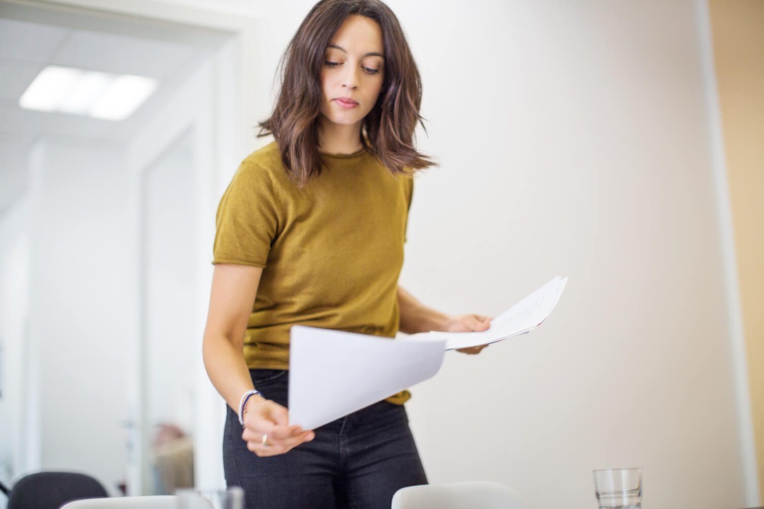 Woman looking over legal documents