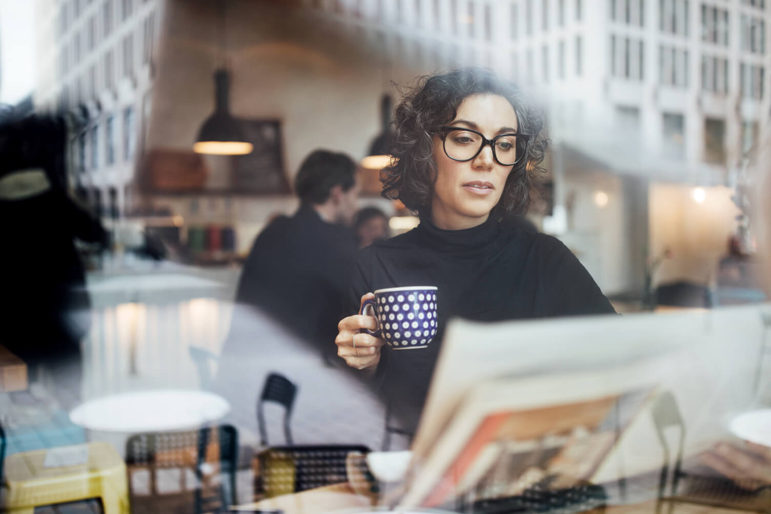 Woman reading a newspaper