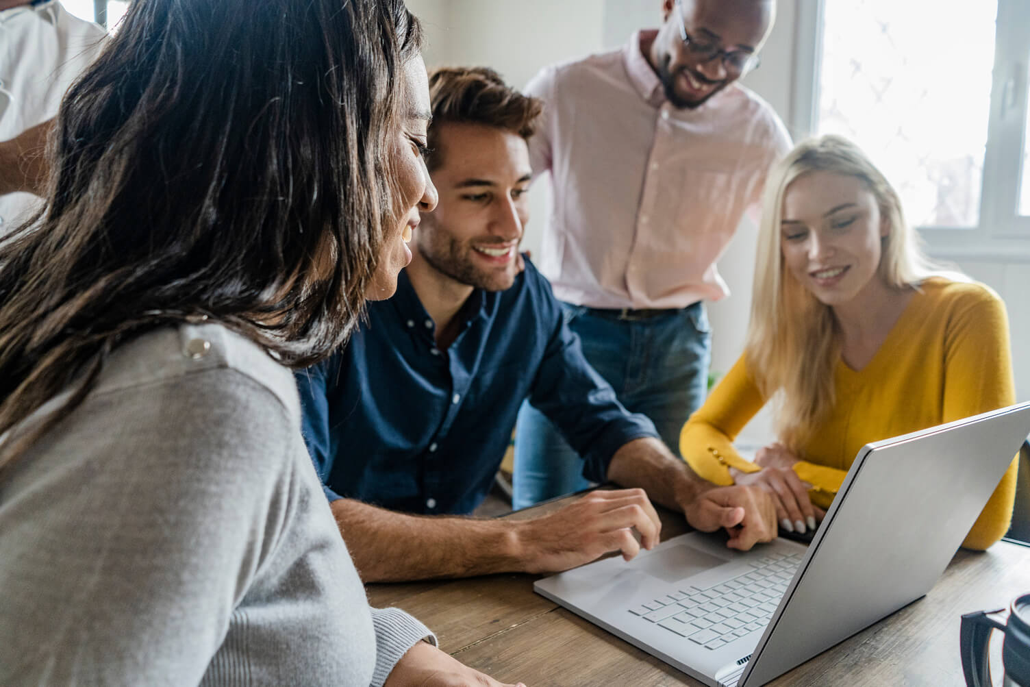 Meeting around a laptop