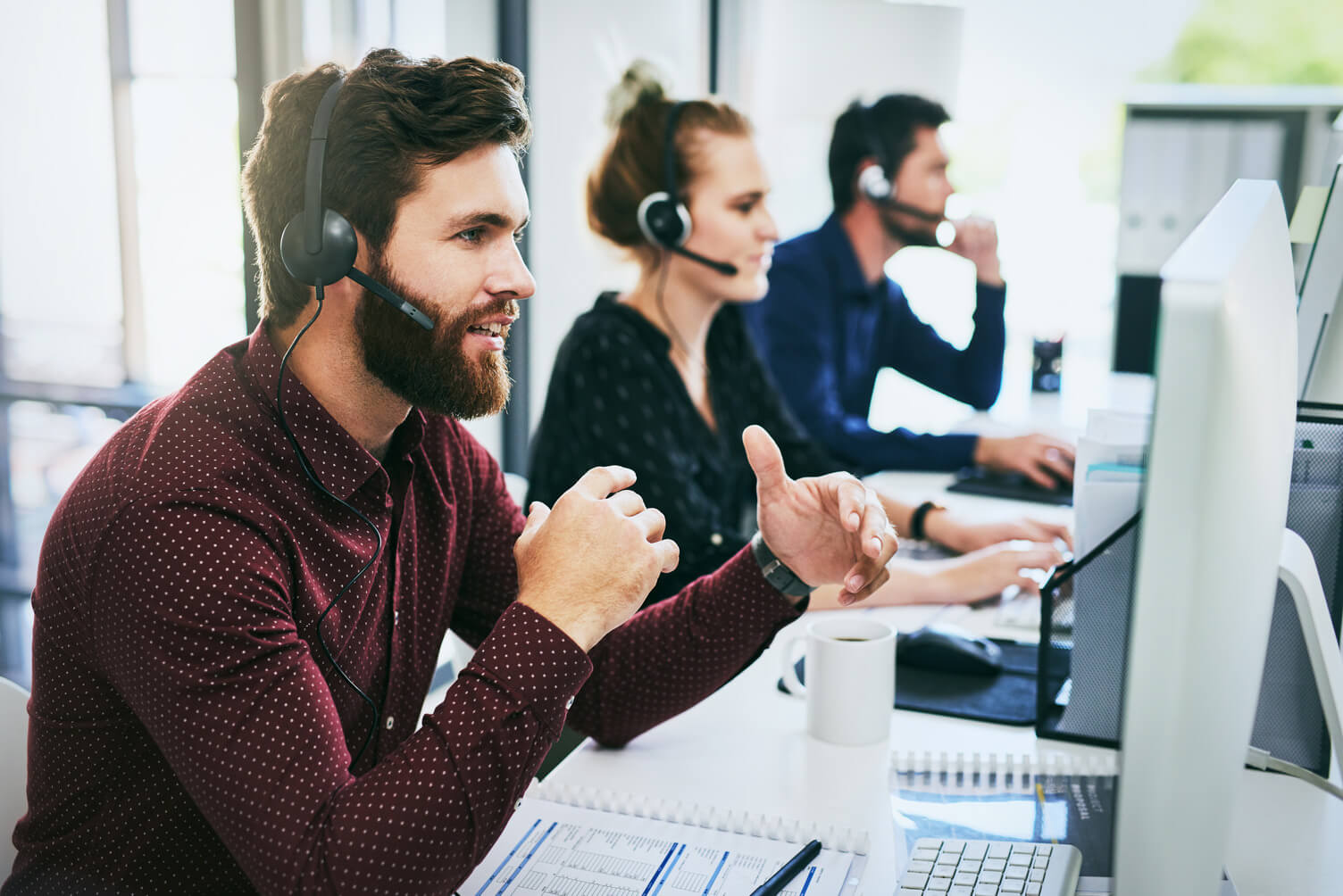 A group of colleagues in a call centre