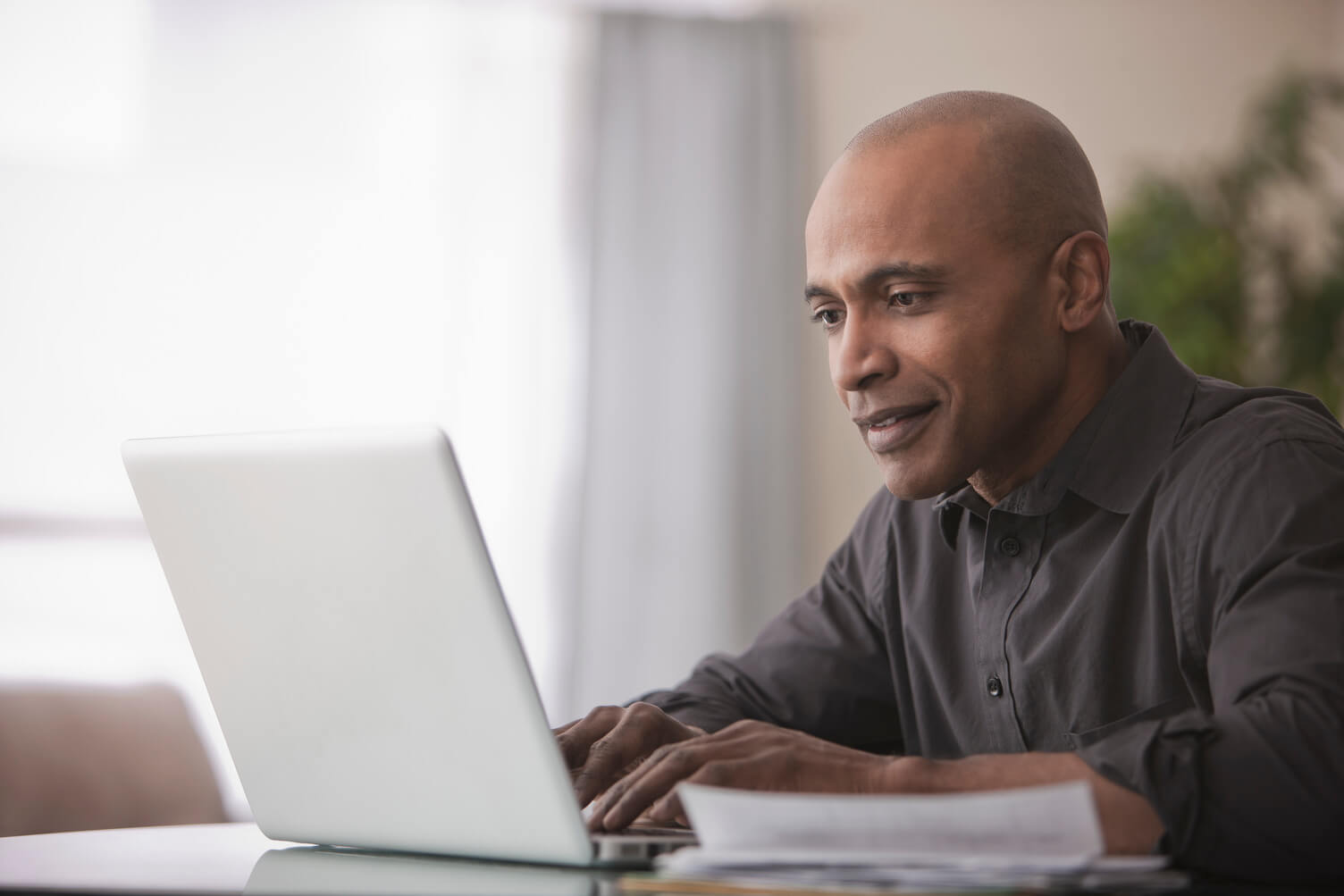 Man looking at a laptop