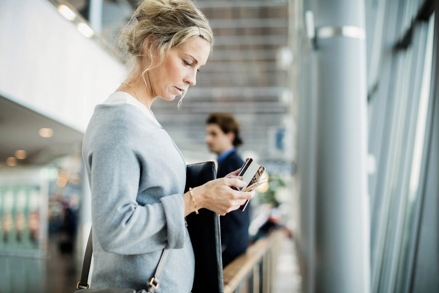 Woman looking at her credit cards