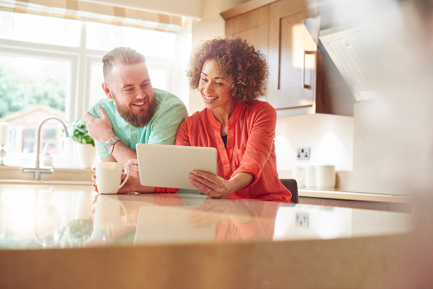 Couple applying for a loan and smiling