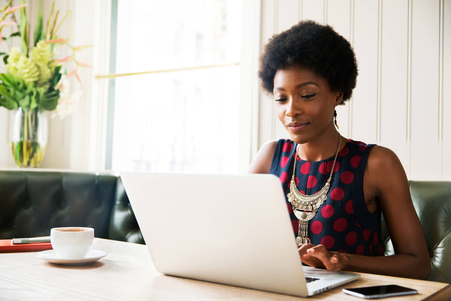 Woman browing on a laptop