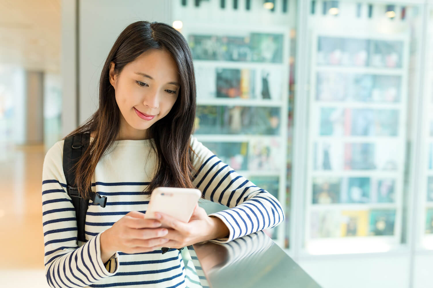 Young woman validating her email on her mobile phone