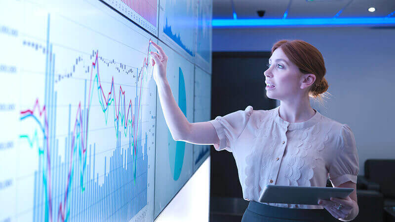 Woman looking at audience analytic data