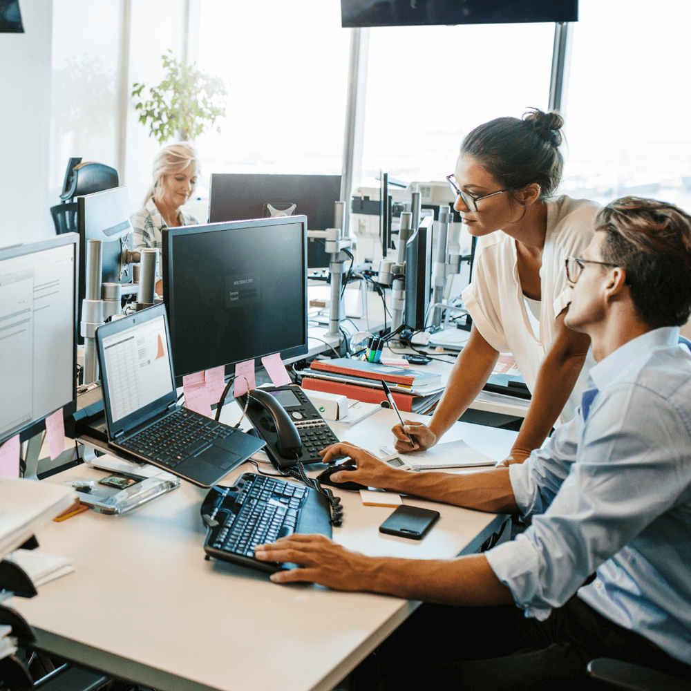 Two colleagues working in an office