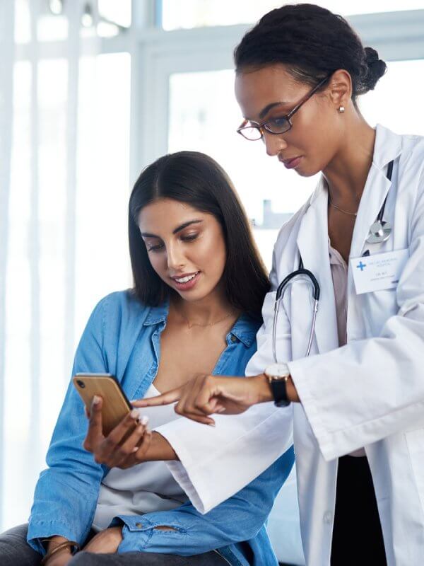 A doctor verifying a patient's identity