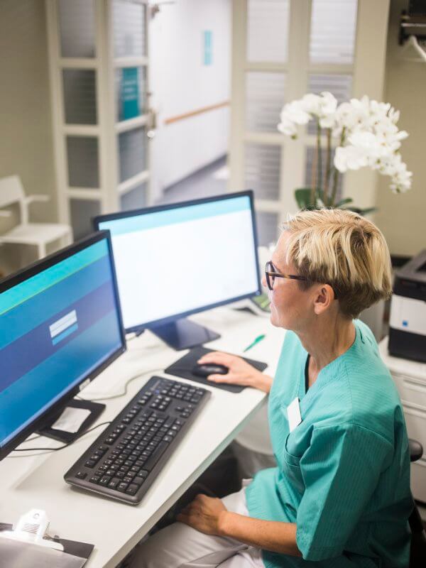 Medical worker looking at patient records