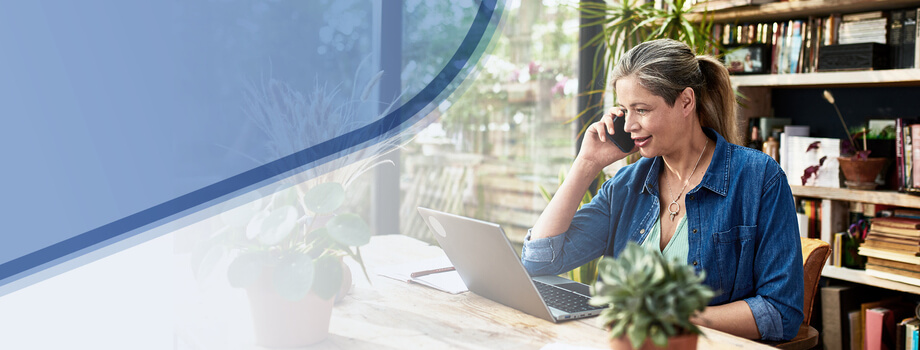 Woman taking a call while working from home