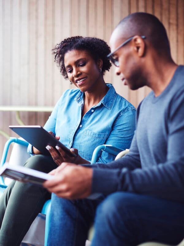 Couple looking over mobile banking information