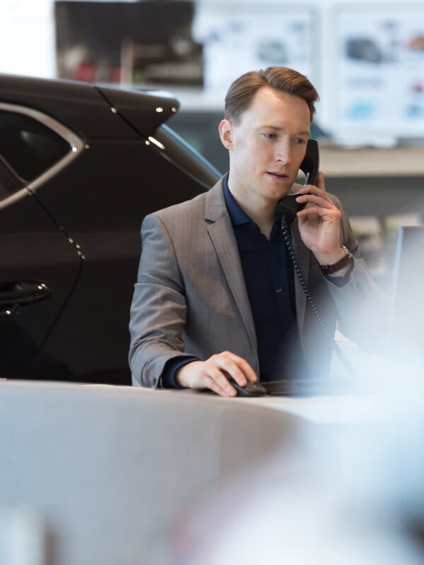 Car salesperson on the phone