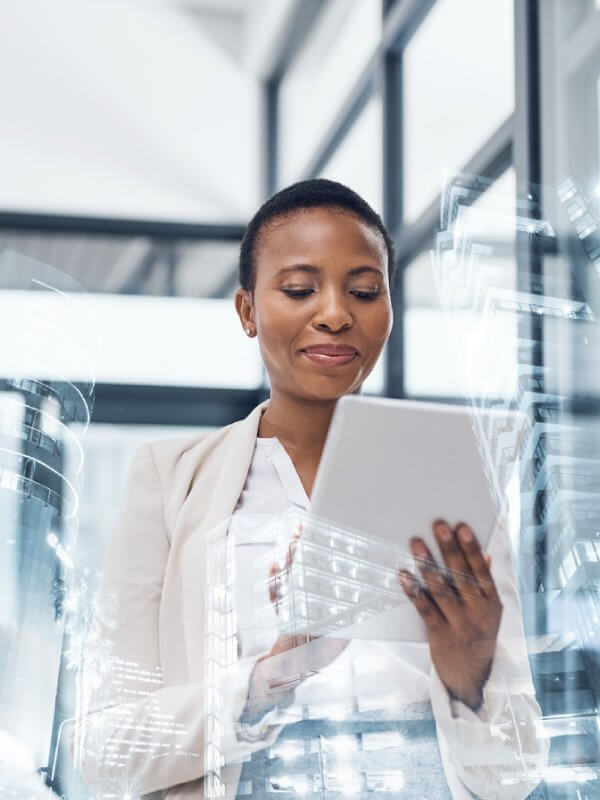 Woman using a tablet in an office building