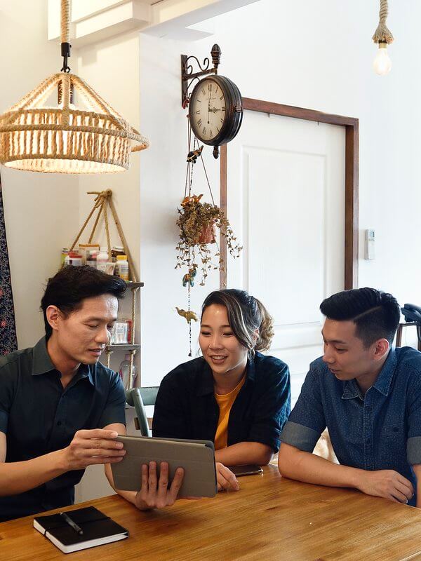 Young couple applying for credit with a financial advisor